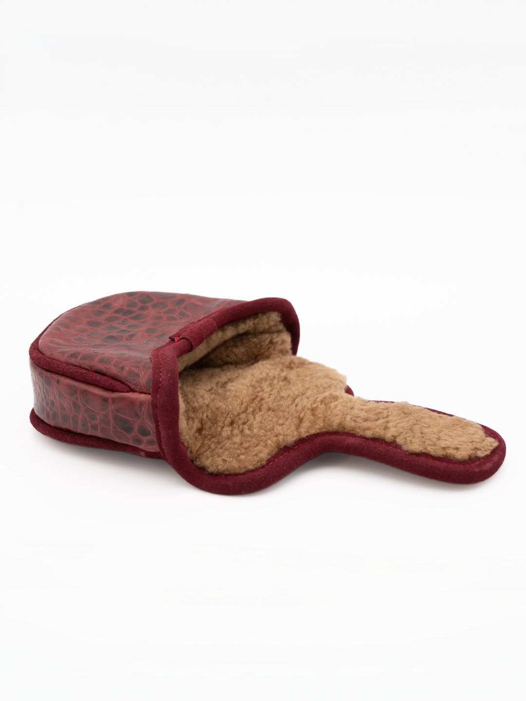 A golf club headcover in a reddish-brown crocodile-embossed leather with a tan sherpa fleece lining, shown open on a white background.